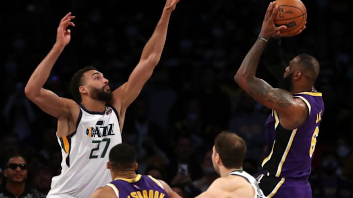 LOS ANGELES, CALIFORNIA - FEBRUARY 16: LeBron James #6 of the Los Angeles Lakers shoots against Rudy Gobert #27 of the Utah Jazz during the fourth quarter at Crypto.com Arena on February 16, 2022 in Los Angeles, California. NOTE TO USER: User expressly acknowledges and agrees that, by downloading and or using this Photograph, user is consenting to the terms and conditions of the Getty Images License Agreement. (Photo by Katelyn Mulcahy/Getty Images) LOS ANGELES, CALIFORNIA - FEBRUARY 16: LeBron James #6 of the Los Angeles Lakers shoots against Rudy Gobert #27 of the Utah Jazz during the fourth quarter at Crypto.com Arena on February 16, 2022 in Los Angeles, California. NOTE TO USER: User expressly acknowledges and agrees that, by downloading and or using this Photograph, user is consenting to the terms and conditions of the Getty Images License Agreement. (Photo by Katelyn Mulcahy/Getty Images)