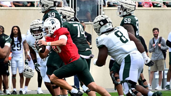 Auburn footballApr 15, 2023; East Lansing, MI, USA; Michigan State Spartans quarterback Payton Thorne (10) runs for a touchdown during a scrimmage at Spartan Stadium. Mandatory Credit: Dale Young-USA TODAY Sports