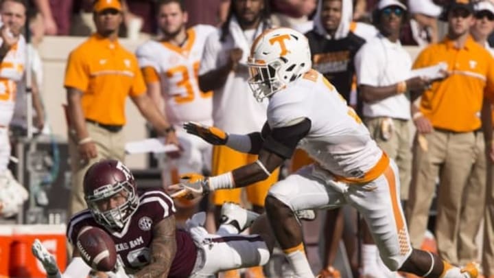 Oct 8, 2016; College Station, TX, USA; Texas A&M Aggies wide receiver Jeremy Tabuyo (19) tries but cannot make the catch as Tennessee Volunteers defensive back Marquill Osborne (3) defends during the second quarter at Kyle Field. Mandatory Credit: Jerome Miron-USA TODAY Sports