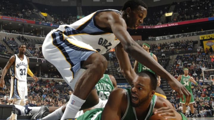 MEMPHIS, TN - DECEMBER 14: Hasheem Thabeet #34 of the Memphis Grizzlies scrambles for a loose ball against Sheldon WIlliams #13 of the Boston Celtics on December 14, 2009 at FedExForum in Memphis, Tennessee. NOTE TO USER: User expressly acknowledges and agrees that, by downloading and or using this photograph, User is consenting to the terms and conditions of the Getty Images License Agreement. Mandatory Copyright Notice: Copyright 2009 NBAE (Photo by Joe Murphy/NBAE via Getty Images)