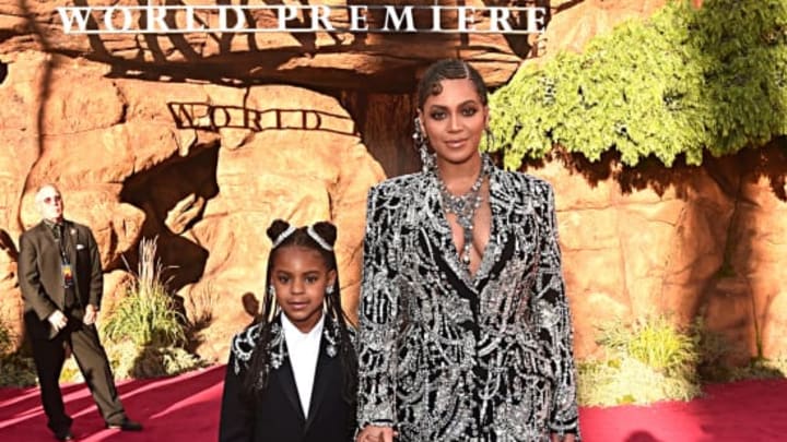 HOLLYWOOD, CALIFORNIA – JULY 09: (EDITORS NOTE: Retransmission with alternate crop.) Blue Ivy Carter (L) and Beyonce Knowles-Carter attend the World Premiere of Disney’s “THE LION KING” at the Dolby Theatre on July 09, 2019 in Hollywood, California. (Photo by Alberto E. Rodriguez/Getty Images for Disney)