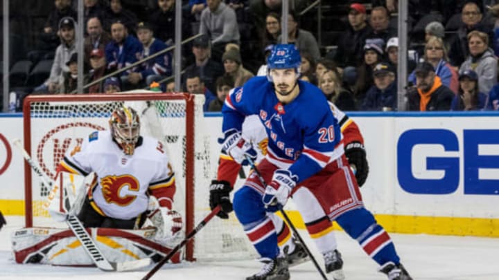 NEW YORK, NY – OCTOBER 21: New York Rangers Left Wing Chris Kreider (20) takes the puck out from behind the net during the third period of a regular season NHL game between the Calgary Flames and the New York Rangers on October 21, 2018, at Madison Square Garden in New York, NY. (Photo by David Hahn/Icon Sportswire via Getty Images)