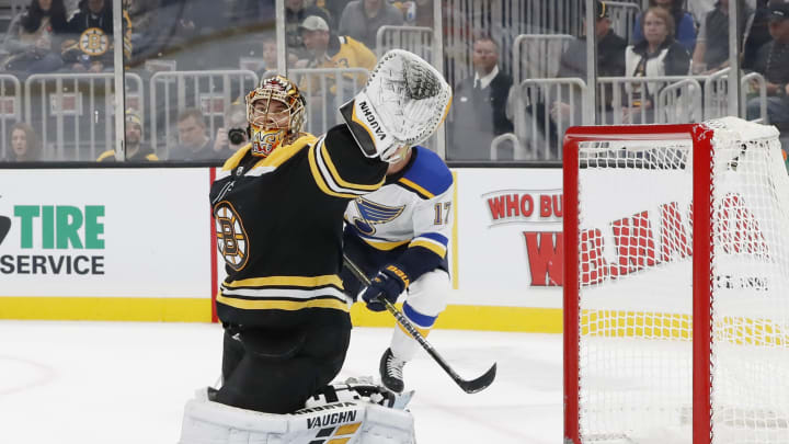 BOSTON, MA - OCTOBER 26: Boston Bruins goalie Tuukka Rask (40) makes sure the puck goes high of the goal during a game between the Boston Bruins and the St. Louis Blues on October 26, 2019, at TD Garden in Boston, Massachusetts. (Photo by Fred Kfoury III/Icon Sportswire via Getty Images)