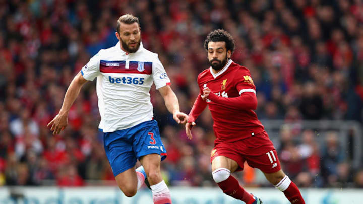 LIVERPOOL, ENGLAND - APRIL 28: Erik Pieters of Stoke City and Mohamed Salah of Liverpool in action during the Premier League match between Liverpool and Stoke City at Anfield on April 28, 2018 in Liverpool, England. (Photo by Clive Brunskill/Getty Images)
