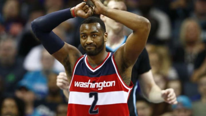 Mar 18, 2017; Charlotte, NC, USA; Washington Wizards guard John Wall (2) reacts after a turnover in the second half against the Charlotte Hornets at Spectrum Center. The Hornets defeated the Wizards 98-93. Mandatory Credit: Jeremy Brevard-USA TODAY Sports