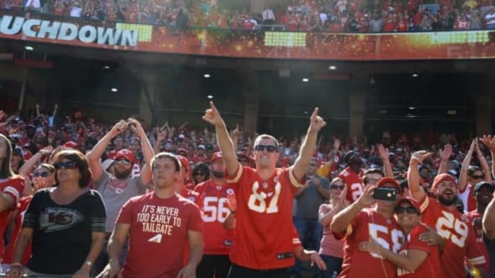 Kansas City Chiefs fans celebrate after the game against the San Diego Chargers at Arrowhead Stadium. Kansas City won 33-27. Credit: John Rieger-USA TODAY Sports