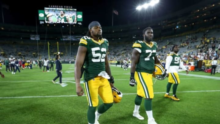 GREEN BAY, WISCONSIN – AUGUST 08: Rashan Gary #52 and Yosh Nijman #73 of the Green Bay Packers walk off the field after beating the Houston Texans 28-26 in a preseason game at Lambeau Field on August 08, 2019 in Green Bay, Wisconsin. (Photo by Dylan Buell/Getty Images)