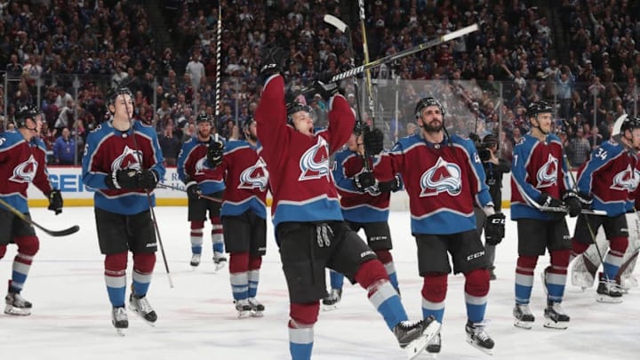 DENVER, CO - APRIL 07: Sven Andrighetto #10 and members of the Colorado Avalanche celebrate the victory against the St. Louis Blues at the Pepsi Center on April 7, 2018 in Denver, Colorado. The Avalanche defeated the Blues 5-2. (Photo by Michael Martin/NHLI via Getty Images)