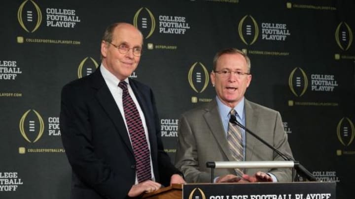 Oct 16, 2013; Irving, TX, USA; College Football Playoff executive director Bill Hancock (left) and new chairman of the playoff committee Jeff Long right) answer questions during a press conference at the College Football Playoff Headquarters. Mandatory Credit: Kevin Jairaj-USA TODAY Sports