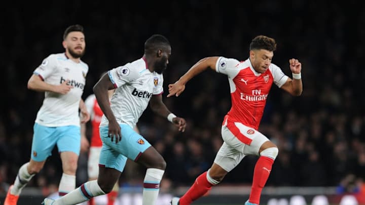 LONDON, ENGLAND - APRIL 05: Alex Oxlade-Chamberlain of Arsenal takes on Arthur Masuaku of West Ham during the Premier League match between Arsenal and West Ham United at Emirates Stadium on April 5, 2017 in London, England. (Photo by David Price/Arsenal FC via Getty Images)