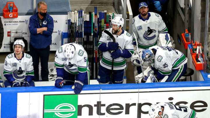 EDMONTON, ALBERTA - SEPTEMBER 04: The Vancouver Canucks react to their deficit against the Vegas Golden Knights late in the third period in Game Seven of the Western Conference Second Round during the 2020 NHL Stanley Cup Playoffs at Rogers Place on September 04, 2020 in Edmonton, Alberta, Canada. (Photo by Bruce Bennett/Getty Images)