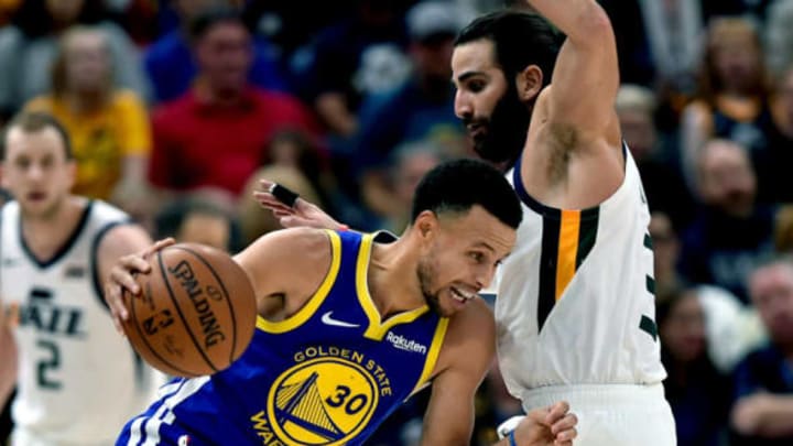 SALT LAKE CITY, UT – OCTOBER 19: Stephen Curry #30 of the Golden State Warriors drives through Ricky Rubio #3 of the Utah Jazz in a NBA game at Vivint Smart Home Arena on October 19, 2018 in Salt Lake City, Utah. NOTE TO USER: User expressly acknowledges and agrees that, by downloading and or using this photograph, User is consenting to the terms and conditions of the Getty Images License Agreement. (Photo by Gene Sweeney Jr./Getty Images)