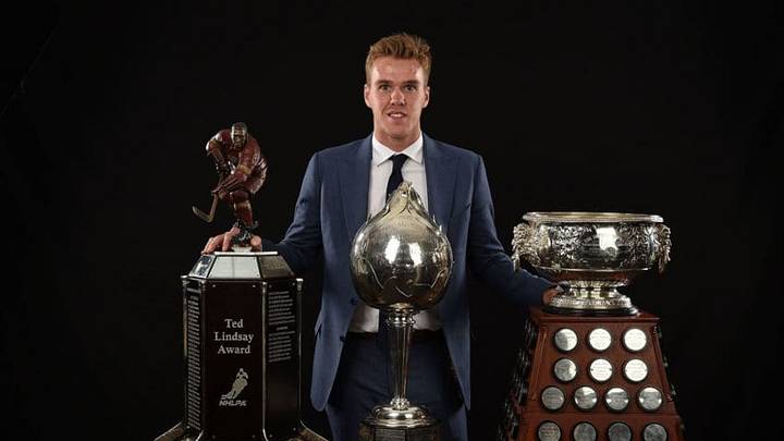 LAS VEGAS, NV - JUNE 21: Connor McDavid of the Edmonton Oilers poses for a portrait with the, from left to right, Ted Lindsay Award, Hart Memorial Trophy and the Art Ross Trophy at the 2017 NHL Awards at T-Mobile Arena on June 21, 2017 in Las Vegas, Nevada. (Photo by Brian Babineau/NHLI via Getty Images)