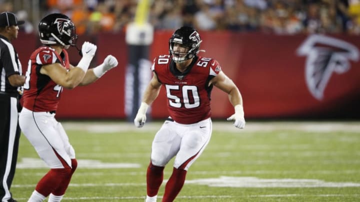 CANTON, OH - AUGUST 01: John Cominsky #50 of the Atlanta Falcons celebrates after a sack in the first half of a preseason game against the Denver Broncos at Tom Benson Hall Of Fame Stadium on August 1, 2019 in Canton, Ohio. (Photo by Joe Robbins/Getty Images)