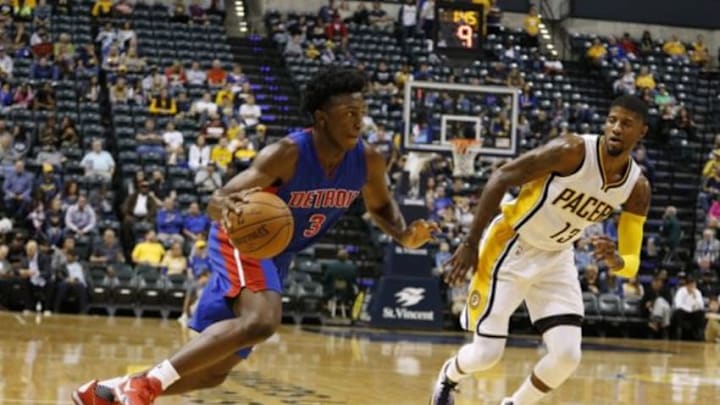 Oct 13, 2015; Indianapolis, IN, USA; Detroit Pistons forward Stanley Johnson (3) drives to the basket against Indiana Pacers forward Paul George (13) at Bankers Life Fieldhouse. Mandatory Credit: Brian Spurlock-USA TODAY Sports