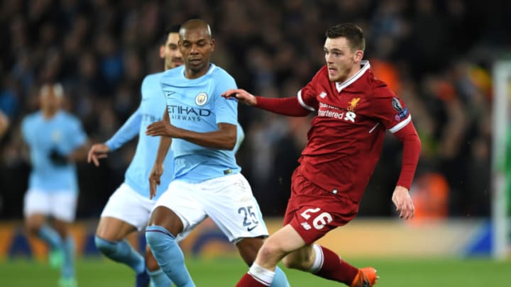 LIVERPOOL, ENGLAND - APRIL 04: Andy Robertson of Liverpool is challenged by Fernandinho of Manchester City during the UEFA Champions League Quarter Final Leg One match between Liverpool and Manchester City at Anfield on April 4, 2018 in Liverpool, England. (Photo by Shaun Botterill/Getty Images)