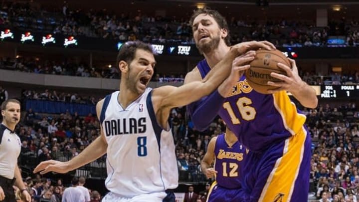 Jan 7, 2014; Dallas, TX, USA; Dallas Mavericks point guard Jose Calderon (8) battles for the ball with Los Angeles Lakers center Pau Gasol (16) during the second half at the American Airlines Center. The Mavericks won 110-97. Mandatory Credit: Jerome Miron-USA TODAY Sports
