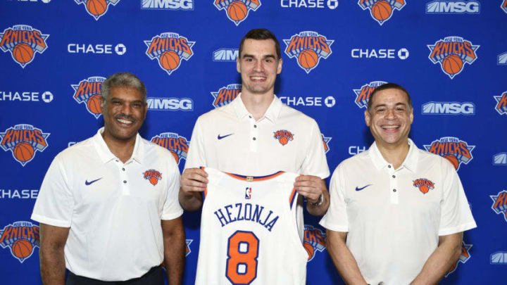 LAS VEGAS, NV - JULY 10: President Steve Mills, Mario Hezonja, and General Manager Scott Perry of the New York Knicks poses for a photo announcing Mario's signing on July 10, 2018 at Thomas and Mack Center in Las Vegas, Nevada. NOTE TO USER: User expressly acknowledges and agrees that, by downloading and or using this photograph, User is consenting to the terms and conditions of the Getty Images License Agreement. Mandatory Copyright Notice: Copyright 2018 NBAE (Photo by David Dow/NBAE via Getty Images)