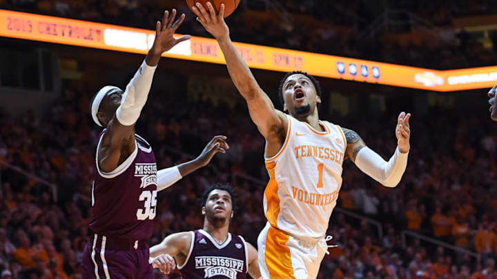 KNOXVILLE, TN - MARCH 5: Tennessee Volunteers guard Lamonte Turner (1) drives around Mississippi State Bulldogs forward Aric Holman (35) for a basket during a college basketball game between the Tennessee Volunteers and Mississippi State Bulldogs on March 5, 2019, at Thompson-Boling Arena in Knoxville, TN. (Photo by Bryan Lynn/Icon Sportswire via Getty Images)