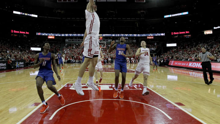 MADISON, WISCONSIN – DECEMBER 13: Ethan Happ #22 of the Wisconsin Badgers dunks the ball in the second half against the Savannah State Tigers at the Kohl Center on December 13, 2018 in Madison, Wisconsin. (Photo by Dylan Buell/Getty Images)
