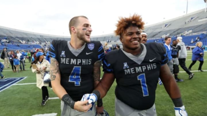 MEMPHIS, TN – NOVEMBER 18: Riley Ferguson #4 and O’Bryan Goodson #1 of the Memphis Tigers celebrate after defeating the SMU Mustangs on November 18, 2017 at Liberty Bowl Memorial Stadium in Memphis, Tennessee. Memphis defeated SMU 66-45. (Photo by Joe Murphy/Getty Images)