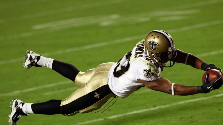 MIAMI GARDENS, FL – FEBRUARY 07: Pierre Thomas #23 of the New Orleans Saints dives into the endzone for a touchdown in the third quarter against the Indianapolis Colts during Super Bowl XLIV on February 7, 2010 at Sun Life Stadium in Miami Gardens, Florida. (Photo by Win McNamee/Getty Images)