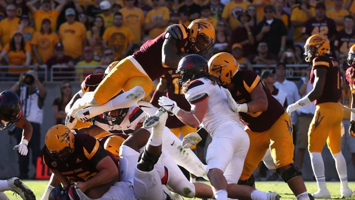 TEMPE, AZ – NOVEMBER 25: Running back Kalen Ballage #7 of the Arizona State Sun Devils dives into the endzone to score on a one yard rushing touchdown against the Arizona Wildcats during the first half of the college football game at Sun Devil Stadium on November 25, 2017 in Tempe, Arizona. (Photo by Christian Petersen/Getty Images)