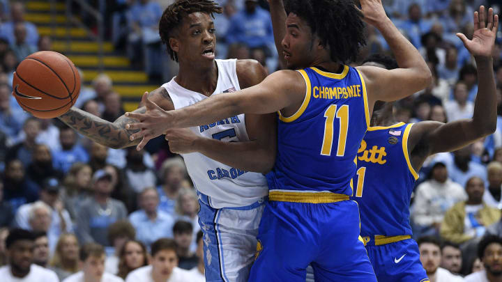 CHAPEL HILL, NORTH CAROLINA – JANUARY 08: Justin Champagnie #11 and Xavier Johnson #1 of the Pittsburgh Panthersdefends Armando Bacot #5 of the North Carolina Tar Heels during the second half of their game at Dean Smith Center on January 08, 2020 in Chapel Hill, North Carolina. Pitt won 73-65. (Photo by Grant Halverson/Getty Images)