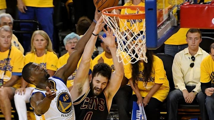 Jun 5, 2016; Oakland, CA, USA; Golden State Warriors forward Harrison Barnes (40) and Cleveland Cavaliers forward Kevin Love (0) go for a rebound in game two of the NBA Finals at Oracle Arena. Mandatory Credit: Bob Donnan-USA TODAY Sports