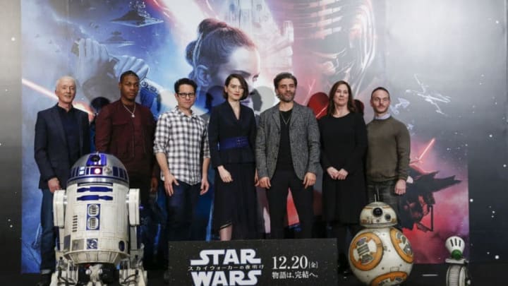TOKYO, JAPAN - DECEMBER 12: (LR) Anthony Daniels, John Boyega, J.J. Abrams, Daisy Ridley, Oscar Isaac, Katherine Kennedy and Chris Terrio with Star Wars characters R2-D2, BB-8 and D-O attend the press conference for 'Star Wars: The Rise of Skywalker' at Toho Cinemas Roppongi on December 12, 2019 in Tokyo, Japan. (Photo by Yuichi Yamazaki/Getty Images)