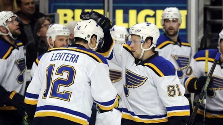 Apr 19, 2016; Chicago, IL, USA; St. Louis Blues right wing Vladimir Tarasenko (91) celebrates with center Jori Lehtera (12) after his goal against the Chicago Blackhawks during the first period in game four of the first round of the 2016 Stanley Cup Playoffs at United Center. Mandatory Credit: David Banks-USA TODAY Sports