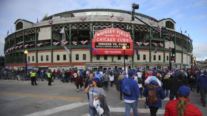 Oct 30, 2016; Chicago, IL, USA; Fans walk in front of Wrigley Field before game five of the 2016 World Series between the Chicago Cubs and the Cleveland Indians. Mandatory Credit: Jerry Lai-USA TODAY Sports