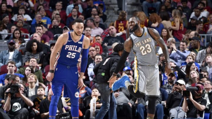 CLEVELAND, OH - MARCH 1: LeBron James #23 of the Cleveland Cavaliers and Ben Simmons #25 of the Philadelphia 76ers talk during the game on March 1, 2018 at Quicken Loans Arena in Cleveland, Ohio. NOTE TO USER: User expressly acknowledges and agrees that, by downloading and/or using this Photograph, user is consenting to the terms and conditions of the Getty Images License Agreement. Mandatory Copyright Notice: Copyright 2018 NBAE (Photo by David Liam Kyle/NBAE via Getty Images)