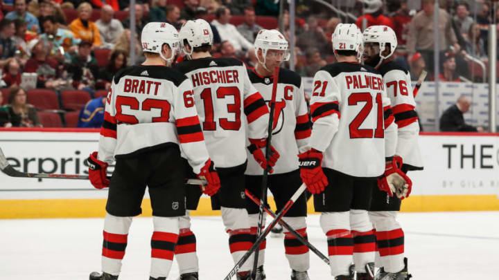 GLENDALE, AZ - DECEMBER 14: The New Jersey Devils discuss strategy during the NHL hockey game between the New Jersey Devils and the Arizona Coyotes on December 14, 2019 at Gila River Arean in Glendale, Arizona. (Photo by Kevin Abele/Icon Sportswire via Getty Images)