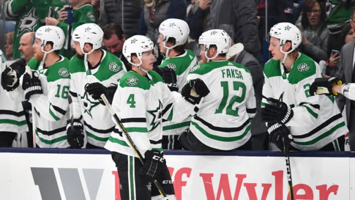 COLUMBUS, OH - OCTOBER 16: Miro Heiskanen #4 of the Dallas Stars high-fives his teammates after scoring a goal during the first period of a game against the Columbus Blue Jackets on October 16, 2019 at Nationwide Arena in Columbus, Ohio. (Photo by Jamie Sabau/NHLI via Getty Images)
