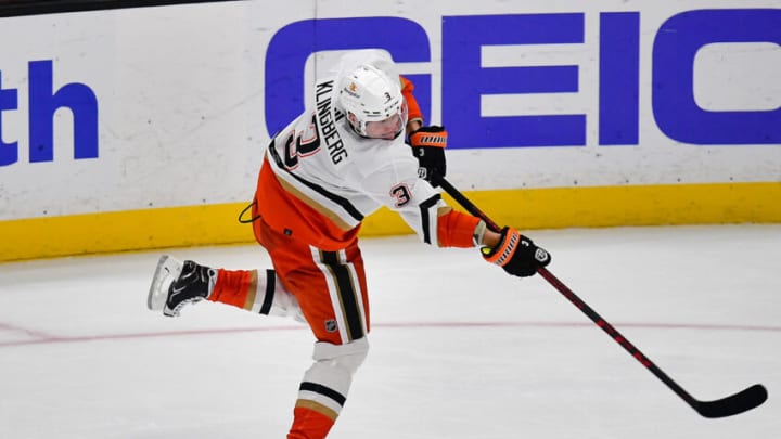 Nov 15, 2022; Anaheim, California, USA; Anaheim Ducks defenseman John Klingberg (3) shoots against the Detroit Red Wings during the third period at Honda Center. Mandatory Credit: Gary A. Vasquez-USA TODAY Sports