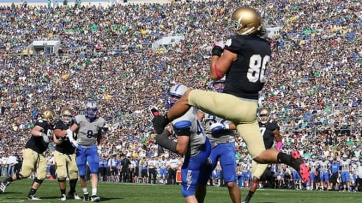 Oct 8, 2011; South Bend, IN, USA; Notre Dame Fighting Irish tight end Tyler Eifert (80) catches the ball in the end zone for a touchdown against the Air Force Falcons at Notre Dame Stadium. Mandatory Credit: Brian Spurlock-USA TODAY Sports