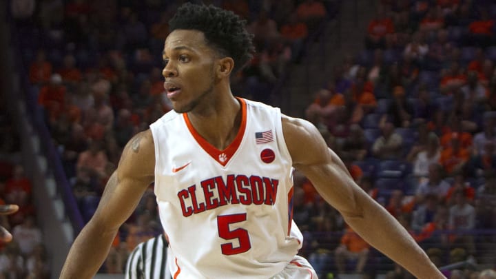 Feb 25, 2017; Clemson, SC, USA; Clemson Tigers forward Jaron Blossomgame (5) looks to pass the ball during the second half against the Florida State Seminoles at Littlejohn Coliseum. Mandatory Credit: Joshua S. Kelly-USA TODAY Sports