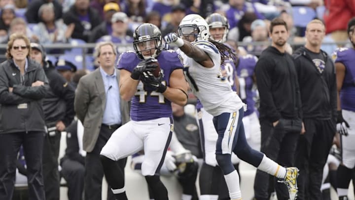 Nov 1, 2015; Baltimore, MD, USA; Baltimore Ravens fullback Kyle Juszczyk (44) catches the ball in front of San Diego Chargers linebacker Joe May (57) during the third quarter at M&T Bank Stadium. The Ravens won 29-26. Mandatory Credit: Tommy Gilligan-USA TODAY Sports