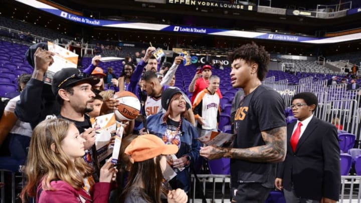 PHOENIX, AZ - DECEMBER 28: Kelly Oubre Jr. #3 of the Phoenix Suns signs autographs for fans prior to the game against the Oklahoma City Thunder on December 28, 2018 at Talking Stick Resort Arena in Phoenix, Arizona. NOTE TO USER: User expressly acknowledges and agrees that, by downloading and or using this photograph, user is consenting to the terms and conditions of the Getty Images License Agreement. Mandatory Copyright Notice: Copyright 2018 NBAE (Photo by Barry GossageNBAE via Getty Images)
