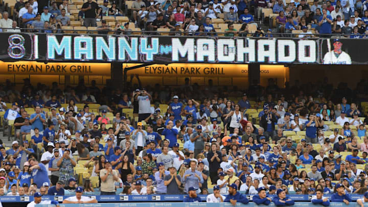 LOS ANGELES, CA - JULY 30: Manny Machado #8 of the Los Angeles Dodgers is announced for his first at bat against the Milwaukee Brewers on July 30, 2018 in Los Angeles, California. (Photo by Jayne Kamin-Oncea/Getty Images)