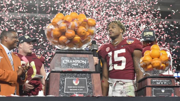 MIAMI GARDENS, FL – DECEMBER 29: Alabama defensive back Xavier McKinney (15) receives the MVP trophy during the winners ceremony of the CFP Semifinal at the Orange Bowl between Alabama Crimson Tide and the Oklahoma Sooners on December 29, 2018, at Hard Rock Stadium in Miami Gardens, FL. (Photo by Roy K. Miller/Icon Sportswire via Getty Images)