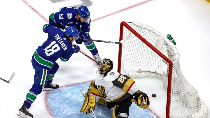 Jake Virtanen scores a goal for the Vancouver Canucks (Photo by Bruce Bennett/Getty Images).