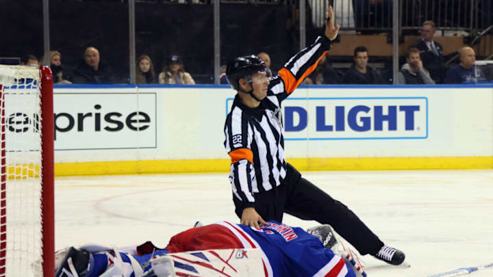 NEW YORK, NEW YORK - DECEMBER 03: Igor Shesterkin #31 of the New York Rangers is injured during the third period against the San Jose Sharks at Madison Square Garden on December 03, 2021 in New York City. The Rangers shutout the Sharks 1-0. (Photo by Bruce Bennett/Getty Images)
