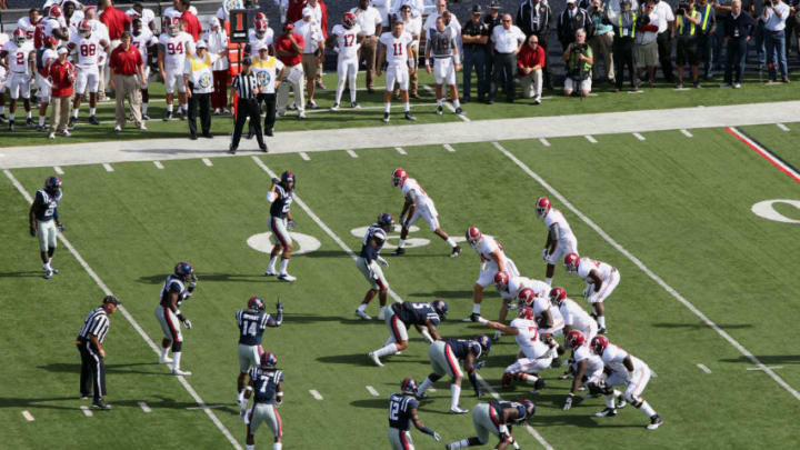 OXFORD, MS - OCTOBER 4: The Ole Miss Rebels defense lines up against the offense of the Alabama Crimson Tide on October 4, 2014 at Vaught-Hemingway Stadium in Oxford, Mississippi. Mississippi beat Alabama 23-17. (Photo by Joe Murphy/Getty Images)