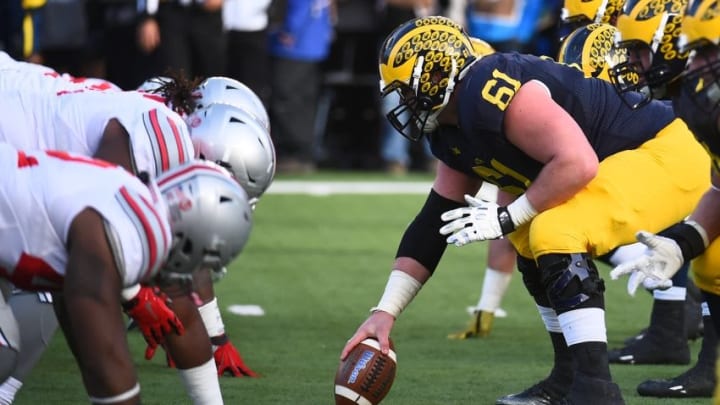 Nov 28, 2015; Ann Arbor, MI, USA; Michigan Wolverines offensive line lines up against the Ohio State Buckeyes defense line during the game at Michigan Stadium. Mandatory Credit: Tim Fuller-USA TODAY Sports