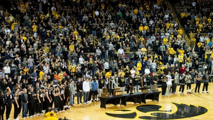 Feb 3, 2016; Iowa City, IA, USA; The Iowa Hawkeyes football team is celebrated at halftime during the basketball game against the Penn State Nittany Lions at Carver-Hawkeye Arena. Iowa won 73-49. Mandatory Credit: Jeffrey Becker-USA TODAY Sports