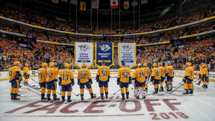 NASHVILLE, TN - OCTOBER 9: The Nashville Predators watch the Presidents' Trophy, Central Division and Western Conference Champions Banner being raised prior to an NHL against the Calgary Flames at Bridgestone Arena on October 9, 2018 in Nashville, Tennessee. (Photo by John Russell/NHLI via Getty Images)