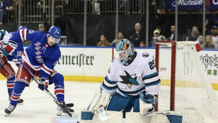 Dec 3, 2023; New York, New York, USA; San Jose Sharks goaltender Mackenzie Blackwood (29) makes a save on a shot on goal attempt by New York Rangers left wing Alexis Lafreniere (13) in the second period at Madison Square Garden. Mandatory Credit: Wendell Cruz-USA TODAY Sports