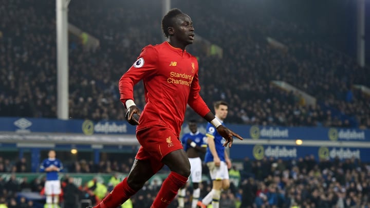 Sadio Mane of Liverpool celebrates after scoring the opening goal during the Premier League match between Everton and Liverpool at Goodison Park on December 19, 2016. (Photo by John Powell/Liverpool FC via Getty Images)